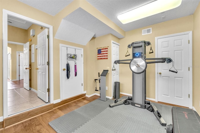 1017 Parkside Pointe Blvd, Apopka, FL 32712 - exercise area with baseboards and wood finished floors