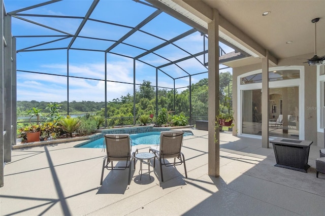 1017 Parkside Pointe Blvd, Apopka, FL 32712 - view of patio / terrace with an outdoor pool, glass enclosure, and a ceiling fan