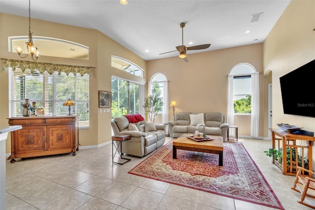 1017 Parkside Pointe Blvd, Apopka, FL 32712 - living room with a ceiling fan, light tile patterned floors, baseboards, recessed lighting, and a chandelier