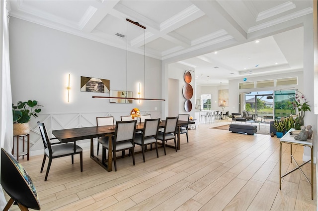 4754 Manning Ct, Sarasota, FL 34240 - dining space featuring beam ceiling, light wood-style floors, coffered ceiling, ornamental molding, and recessed lighting
