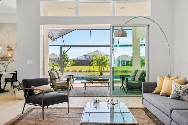 4754 Manning Ct, Sarasota, FL 34240 - living room with wood finished floors, a water view, and a residential view