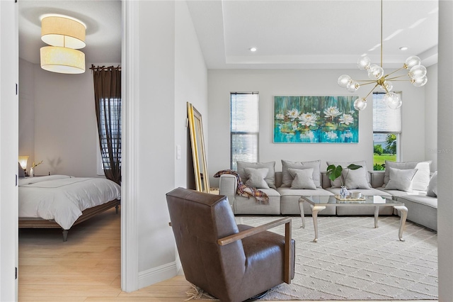 4754 Manning Ct, Sarasota, FL 34240 - living area with light wood-style flooring, a chandelier, recessed lighting, and baseboards