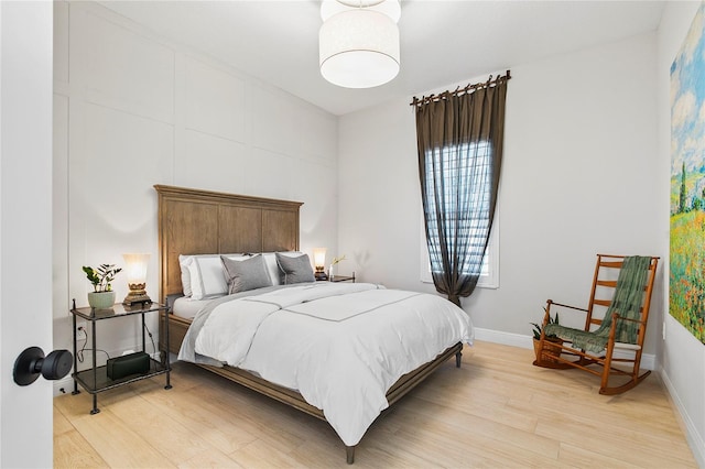 4754 Manning Ct, Sarasota, FL 34240 - bedroom with light wood-style floors and baseboards