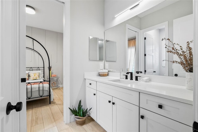 4754 Manning Ct, Sarasota, FL 34240 - bathroom with vanity and wood finished floors