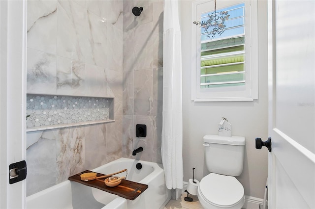 4754 Manning Ct, Sarasota, FL 34240 - bathroom with shower / tub combo, toilet, and baseboards