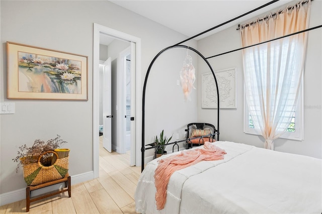 4754 Manning Ct, Sarasota, FL 34240 - bedroom with wood finished floors and baseboards
