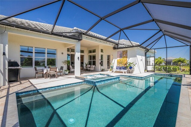 4754 Manning Ct, Sarasota, FL 34240 - view of swimming pool with a patio, grilling area, a lanai, and a pool with connected hot tub