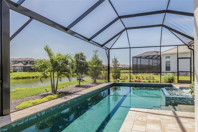 4754 Manning Ct, Sarasota, FL 34240 - view of pool featuring a water view, a pool with connected hot tub, and glass enclosure