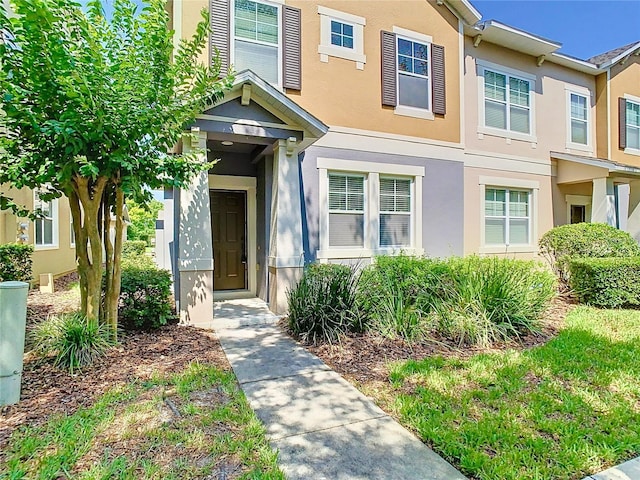 7508 Bentonshire Ave, Windermere, FL 34786 - entrance to property featuring stucco siding