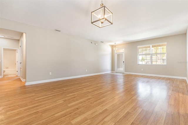 11621 Ashton Field Ave, Riverview, FL 33579 - unfurnished room with light wood-style flooring and baseboards