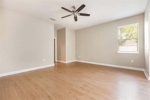 11621 Ashton Field Ave, Riverview, FL 33579 - unfurnished room featuring light wood-style flooring, ceiling fan, and baseboards