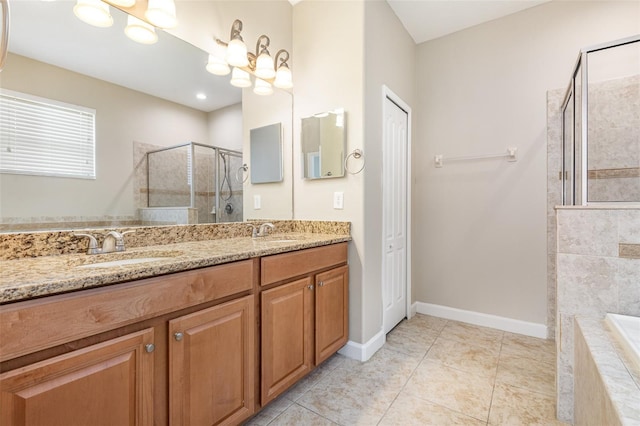 11621 Ashton Field Ave, Riverview, FL 33579 - bathroom featuring a stall shower, double vanity, tile patterned flooring, a bath, and baseboards