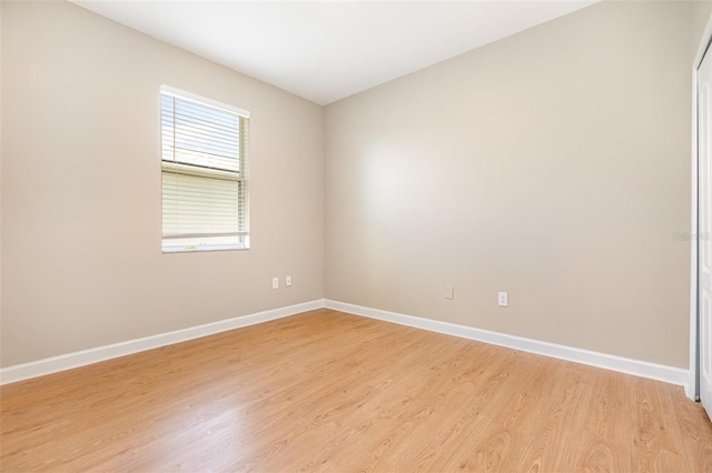 11621 Ashton Field Ave, Riverview, FL 33579 - empty room featuring baseboards and light wood-type flooring