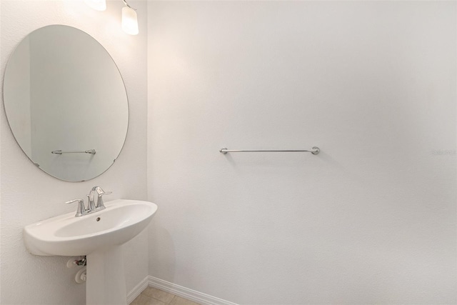 6703 Citrus Creek Ln, Tampa, FL 33625 - bathroom featuring baseboards
