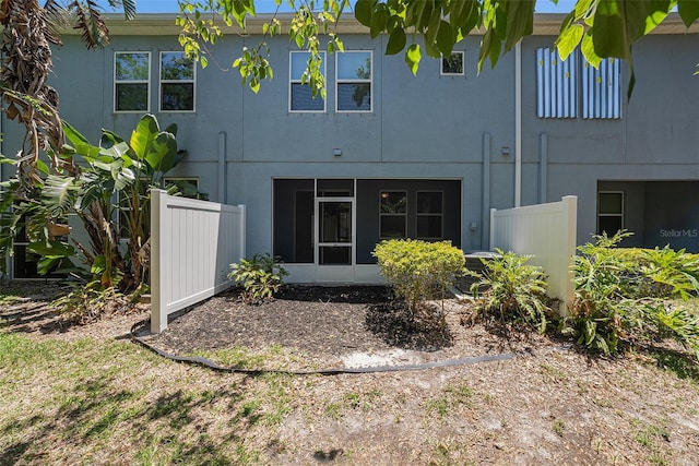 6703 Citrus Creek Ln, Tampa, FL 33625 - back of property featuring stucco siding