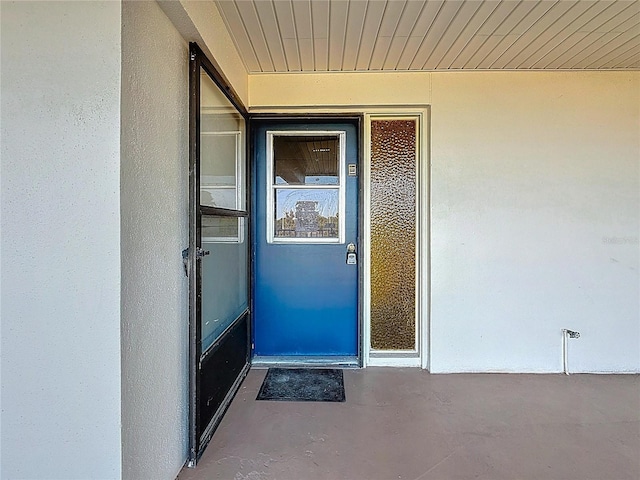 6100 12th St S Unit 313, Saint Petersburg, FL 33705 - view of exterior entry with stucco siding