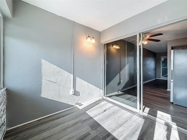 6100 12th St S Unit 313, Saint Petersburg, FL 33705 - interior space featuring wood finished floors and ceiling fan