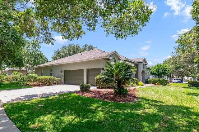 1515 Cherry Lake Way, Lake Mary, FL 32746 - view of front of house featuring stucco siding, an attached garage, a front yard, and concrete driveway