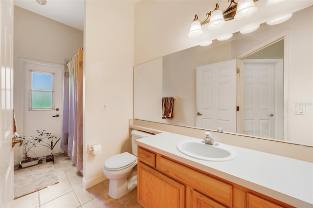 1515 Cherry Lake Way, Lake Mary, FL 32746 - bathroom featuring tile patterned flooring, vanity, toilet, and curtained shower