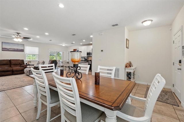15411 Taurus Ct, Mascotte, FL 34753 - dining space with light tile patterned floors, recessed lighting, and ceiling fan