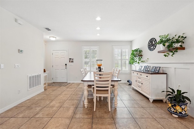 15411 Taurus Ct, Mascotte, FL 34753 - dining space with light tile patterned floors and recessed lighting