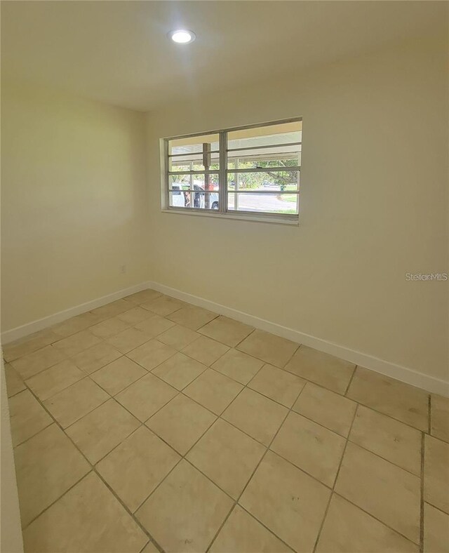 1107 Greenwood Way, Cocoa, FL 32922 - empty room featuring baseboards and recessed lighting
