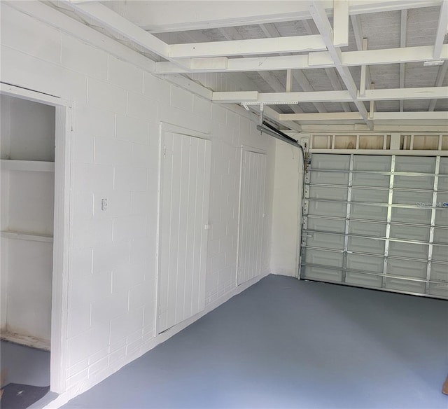 1107 Greenwood Way, Cocoa, FL 32922 - garage featuring concrete block wall