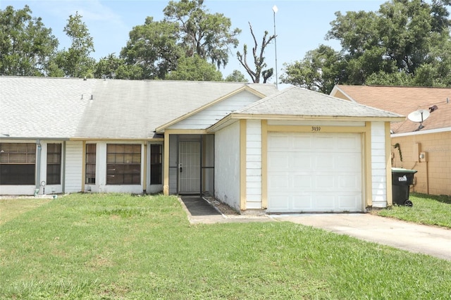 3939 Magnolia Lake Ln, Orlando, FL 32810 - ranch-style house featuring a front yard, an attached garage, and concrete driveway