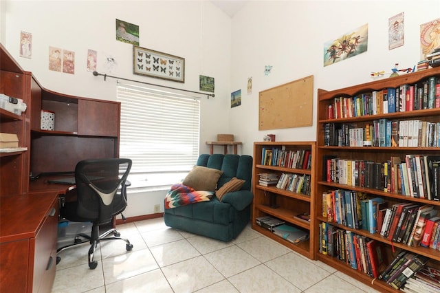 3939 Magnolia Lake Ln, Orlando, FL 32810 - office area featuring a towering ceiling and light tile patterned flooring