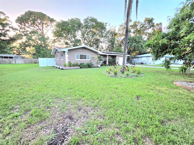 663 68th Ave S, Saint Petersburg, FL 33705 - rear view of property featuring an attached garage