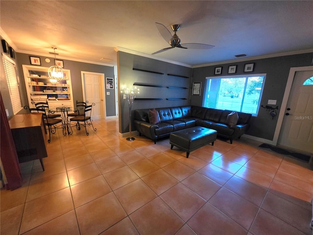 663 68th Ave S, Saint Petersburg, FL 33705 - tiled living room featuring crown molding, baseboards, and a ceiling fan