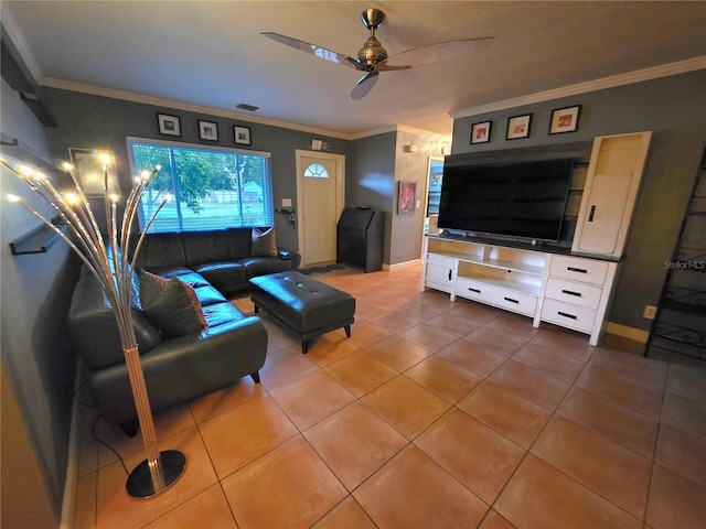 663 68th Ave S, Saint Petersburg, FL 33705 - living room with tile patterned floors, ceiling fan, crown molding, and baseboards