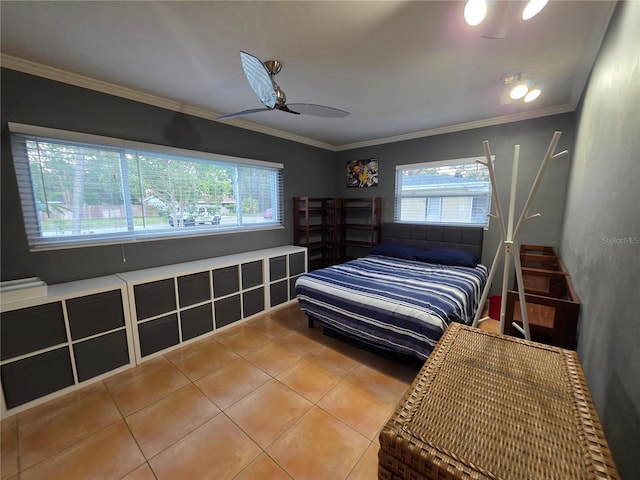 663 68th Ave S, Saint Petersburg, FL 33705 - tiled bedroom featuring multiple windows, crown molding, and a ceiling fan
