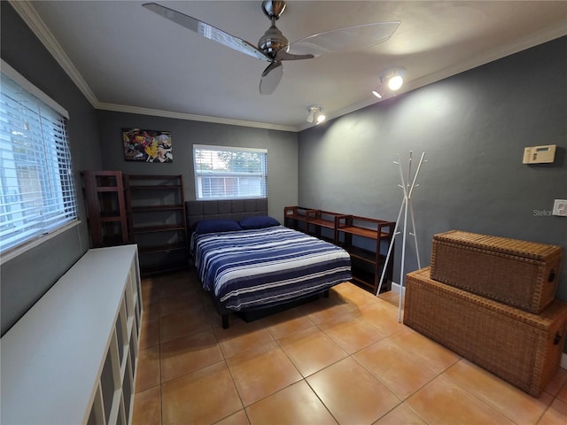 663 68th Ave S, Saint Petersburg, FL 33705 - bedroom featuring ornamental molding, light tile patterned flooring, and ceiling fan