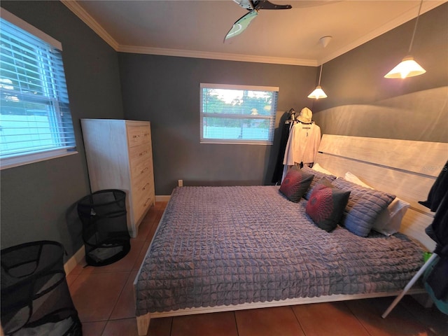 663 68th Ave S, Saint Petersburg, FL 33705 - tiled bedroom featuring multiple windows, ornamental molding, and baseboards