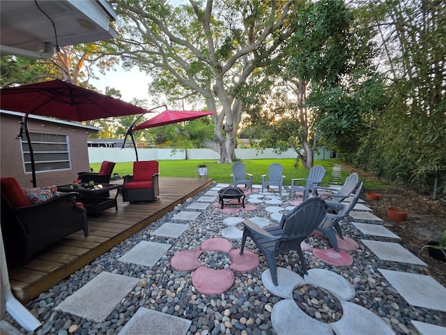 663 68th Ave S, Saint Petersburg, FL 33705 - view of patio with a deck and an outdoor living space with a fire pit