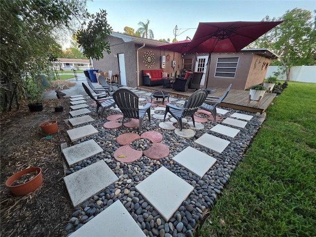 663 68th Ave S, Saint Petersburg, FL 33705 - view of patio / terrace with an outdoor living space and a wooden deck