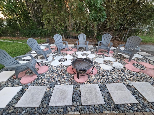 663 68th Ave S, Saint Petersburg, FL 33705 - view of patio with an outdoor fire pit