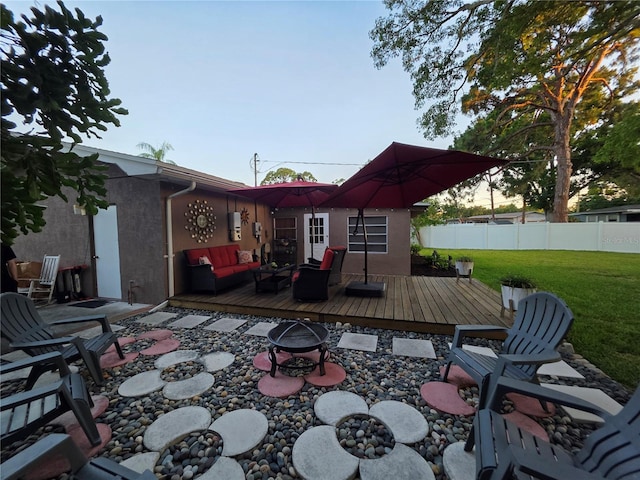 663 68th Ave S, Saint Petersburg, FL 33705 - view of patio with a wooden deck and outdoor lounge area