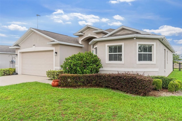 1805 Kingsmill Dr, Bartow, FL 33830 - ranch-style home featuring an attached garage, concrete driveway, stucco siding, and a front yard