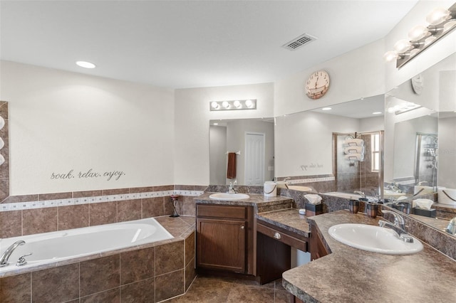 1805 Kingsmill Dr, Bartow, FL 33830 - bathroom with vanity, a bath, and a stall shower