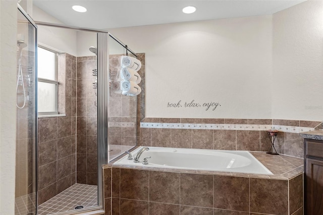 1805 Kingsmill Dr, Bartow, FL 33830 - bathroom with a garden tub, a stall shower, vanity, and recessed lighting