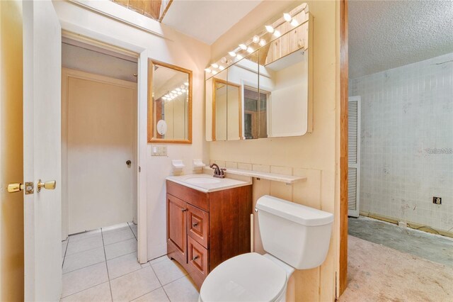 7024 Harwick Dr, Orlando, FL 32818 - bathroom featuring vanity, toilet, and tile patterned floors