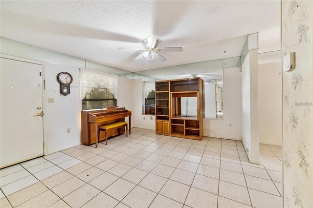7024 Harwick Dr, Orlando, FL 32818 - entryway featuring ceiling fan and light tile patterned floors