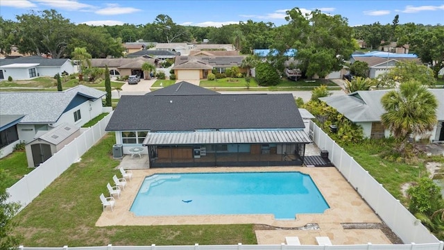 14506 Sutter Pl, Tampa, FL 33625 - view of swimming pool with a residential view, a fenced backyard, and a patio