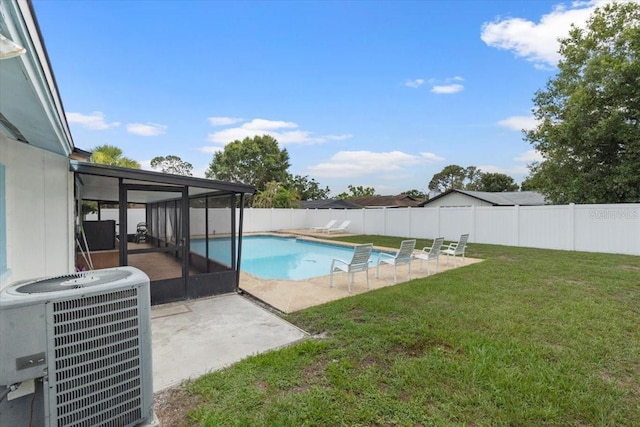 14506 Sutter Pl, Tampa, FL 33625 - view of pool with central AC, a sunroom, and a patio