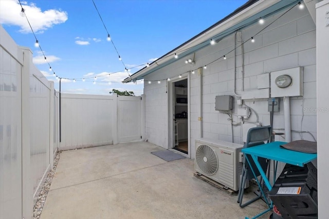 14506 Sutter Pl, Tampa, FL 33625 - view of patio / terrace featuring a cooling unit
