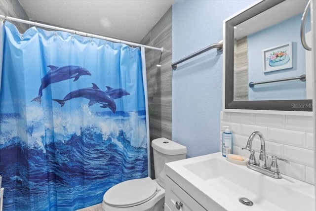14506 Sutter Pl, Tampa, FL 33625 - bathroom featuring toilet, a textured wall, vanity, a shower with curtain, and a textured ceiling