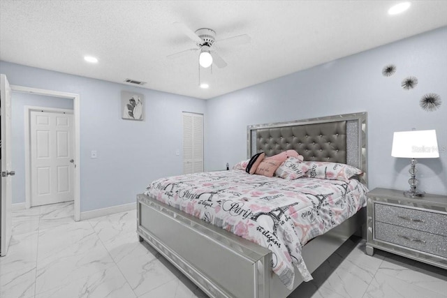 14506 Sutter Pl, Tampa, FL 33625 - bedroom featuring light marble finish floors, recessed lighting, ceiling fan, a closet, and baseboards