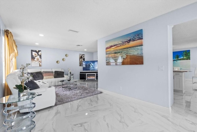 14506 Sutter Pl, Tampa, FL 33625 - living room featuring marble finish flooring, a textured ceiling, baseboards, and recessed lighting
